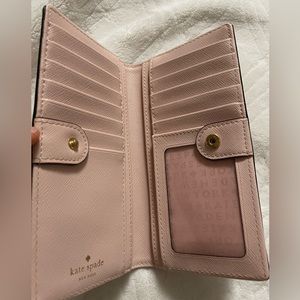 Kate spade Veronica slim bifold wallet. Blush pink with gold hardware.